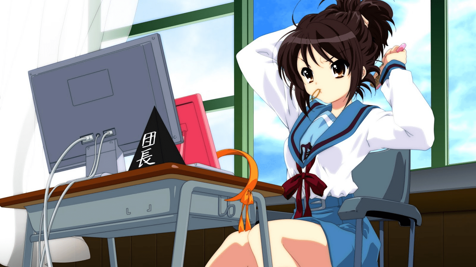 Haruhi Suzumiya at her computer.